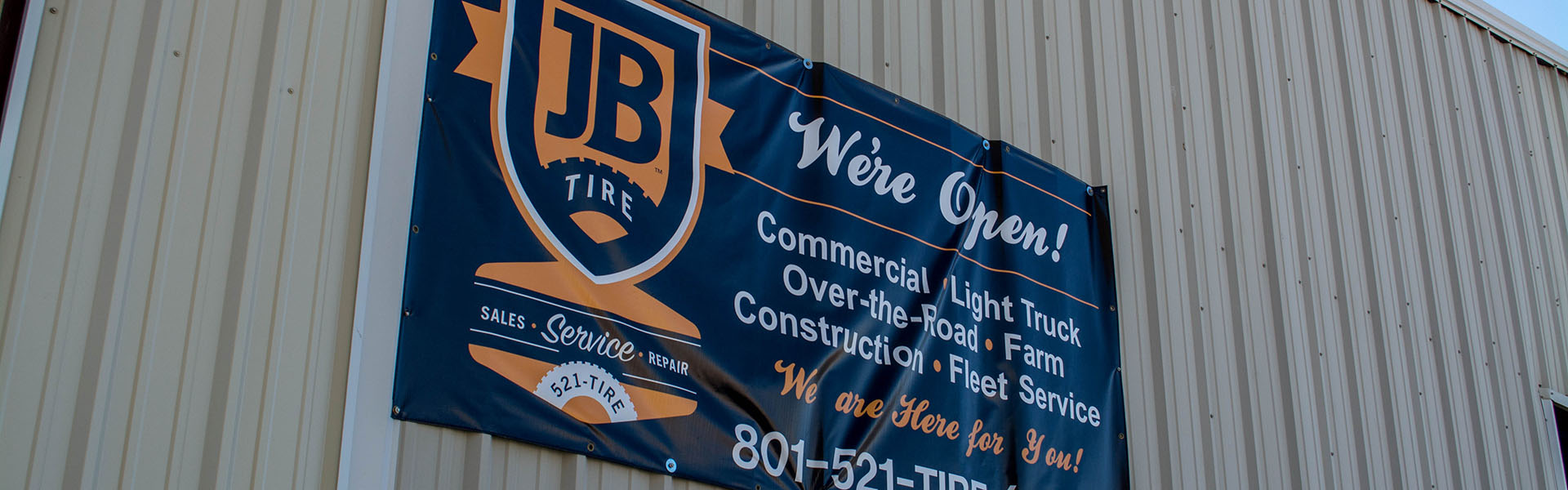 JB Tire Outside Wall Banner